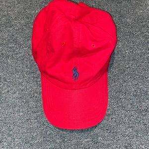 red polo hat